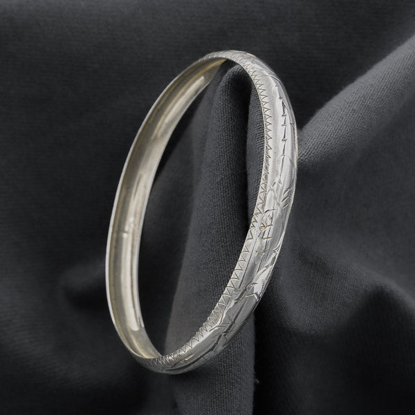 Sterling silver engraved bangle rounded with concave inside