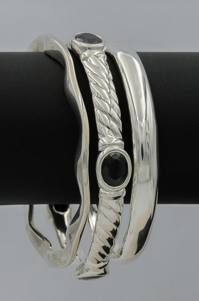 Sterling silver bangle with black cubics
