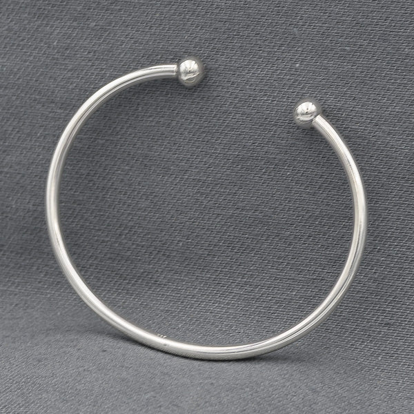 Sterling silver round bangle with a 6mm silver ball at the ends