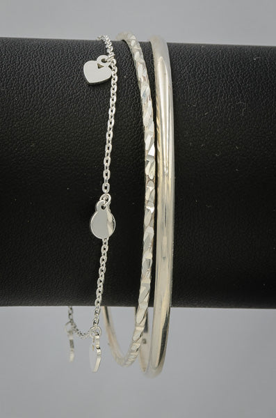 Sterling silver bracelet with circle and heart discs