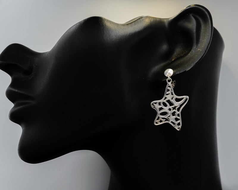 Silver sea star drop earrings