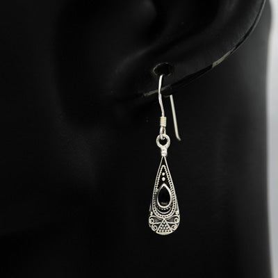 A sterling silver drop earring with onyx