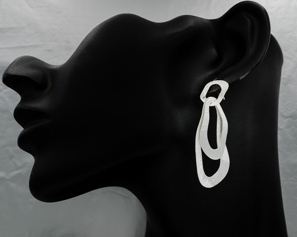 Brushed silver irregular ovals