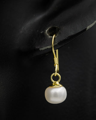 Sterling silver with gold plated dangling pearl earring