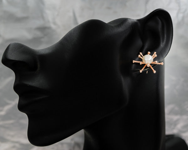 Freshwater pearl set in the middle of rose gold spiral spikes on a chain - Silvertree Jewelry #