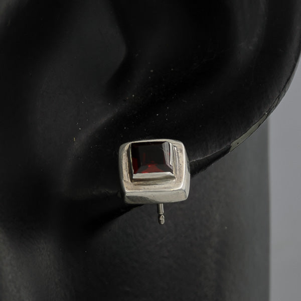 Garnet set in sterling silver stud