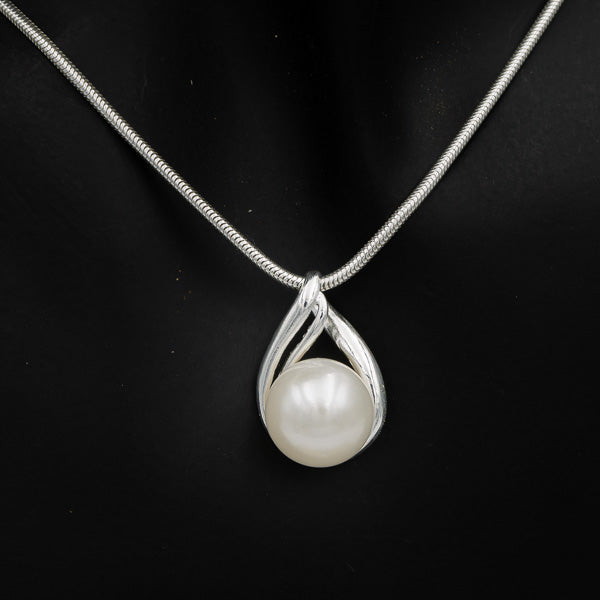 Sterling silver pear shaped pendant with a pearl