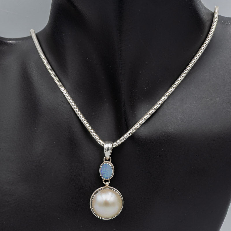 Blue opal and white mabe' pendant set in silver