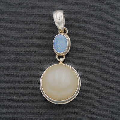 Blue opal and white mabe' pendant set in silver