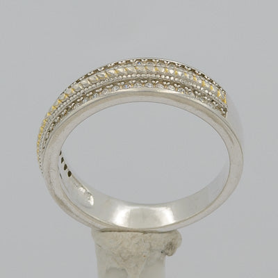 Sterling silver ring with cubics and a gold plated rope