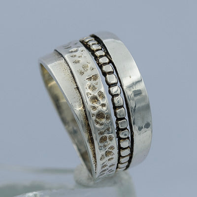 Sterling silver ring with flowing bands
