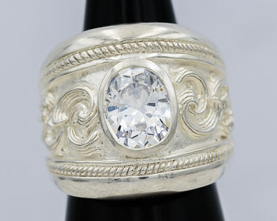 Bold sterling silver ring with a cubic and scrolled patterns