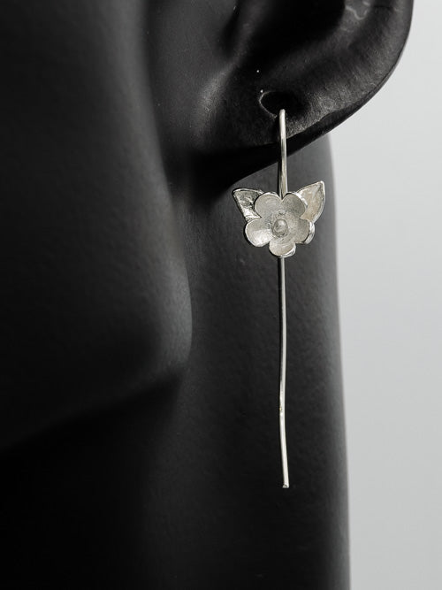 Flower on a long curved hook