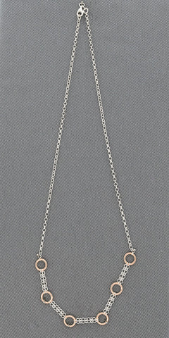 Silver chain with rose gold circles