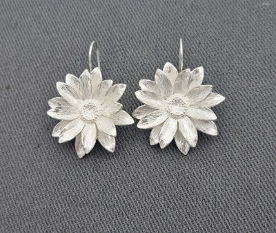 Sterling silver daisy drop earrings