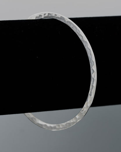 Sterling silver bangle hammered and flat