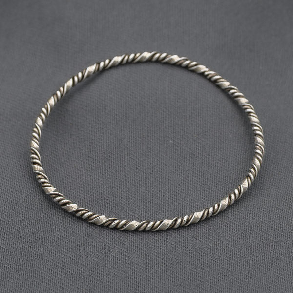 Sterling silver twisted bangle with a twist 60 mm