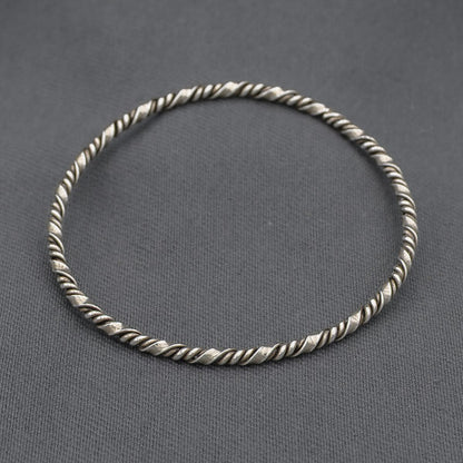 Sterling silver twisted bangle with a twist 60 mm