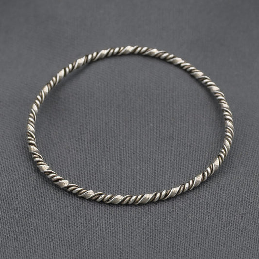 Sterling silver twisted bangle with a twist 60 mm