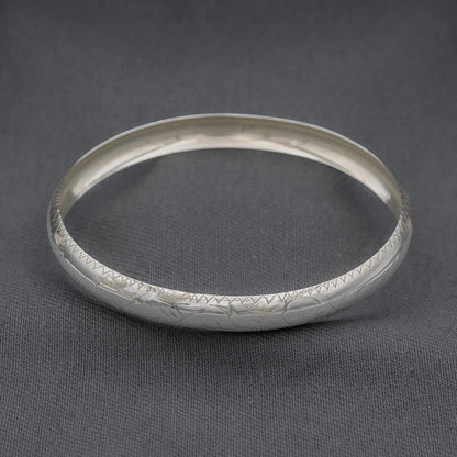 Sterling silver engraved bangle rounded with concave inside