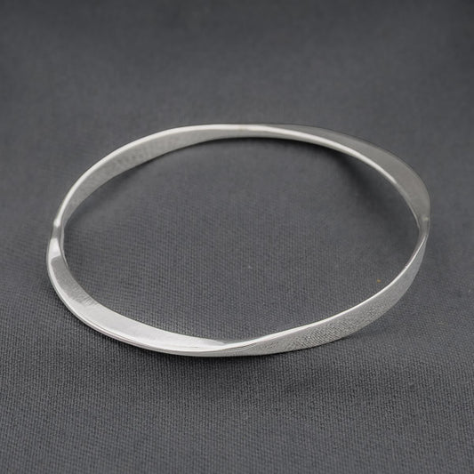 Sterling silver bangle with flat sides