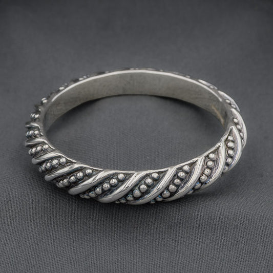 Sterling silver bangle with studs and stripes