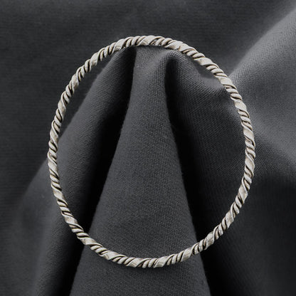 Sterling silver twisted bangle with a twist 60 mm