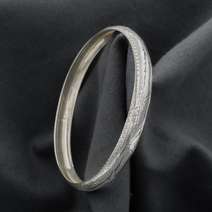 Sterling silver engraved bangle rounded with concave inside