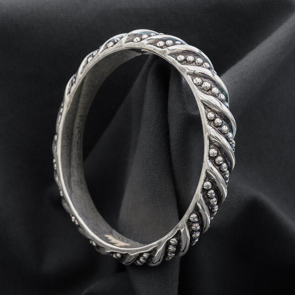 Sterling silver bangle with studs and stripes