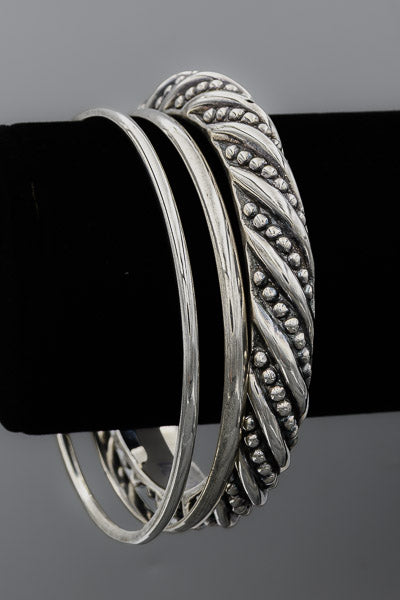 Sterling silver bangle with studs and stripes
