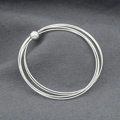 Sterling silver 5 wired bangles in a silver ball