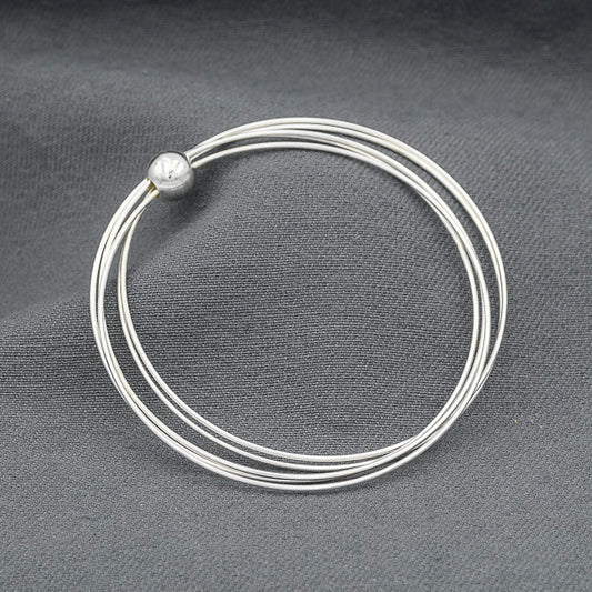 Sterling silver 5 wired bangles in a silver ball