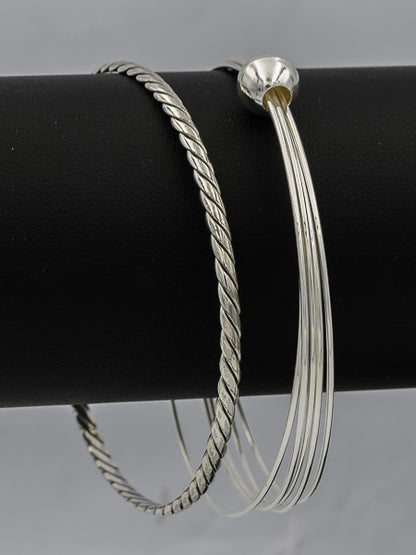 Sterling silver 5 wired bangles in a silver ball