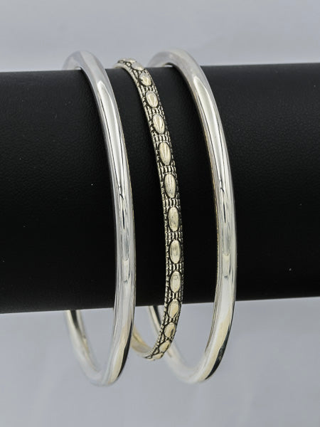Sterling silver bangle with oval patterns