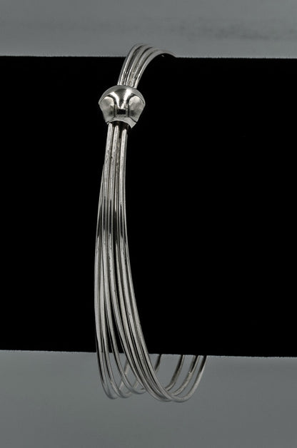 Sterling silver 5 wired bangles in a silver ball