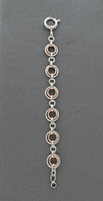 Sterling silver and rose gold circle bracelet