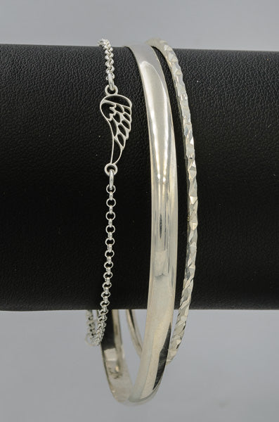 Sterling silver bracelet with an angel wing.