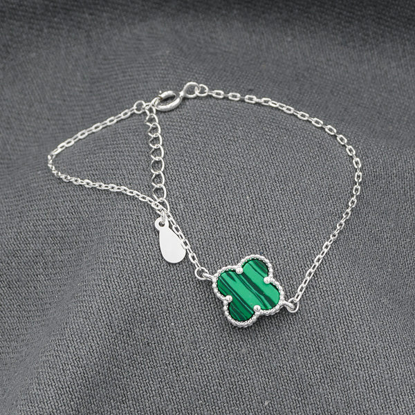 Sterling silver with a Malachite clover disc