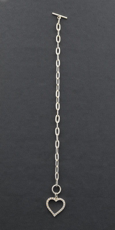 Sterling silver oval link bracelet with a toggle clasp and a cubic zirconia heart