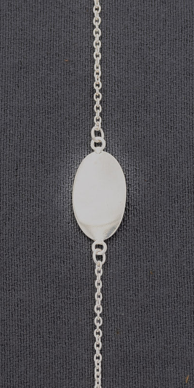 Sterling silver bracelet with an oval disc