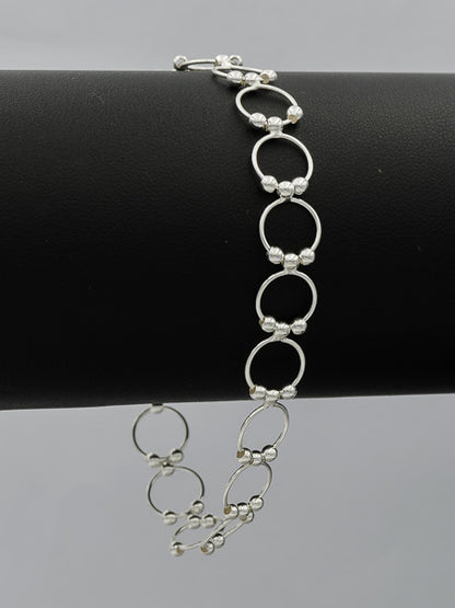 Sterling silver circle with balls bracelet