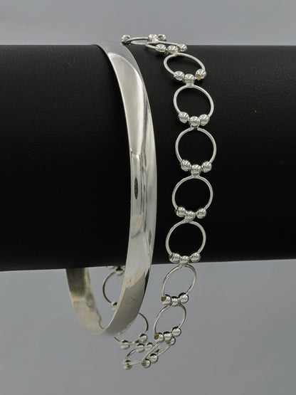 Sterling silver circle with balls bracelet