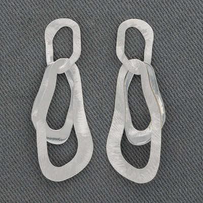 Brushed silver ovals