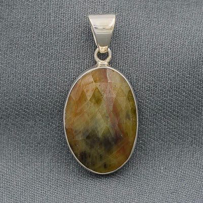 Faceted Imperial Jasper pendant set in sterling silver with natural earthy patterns