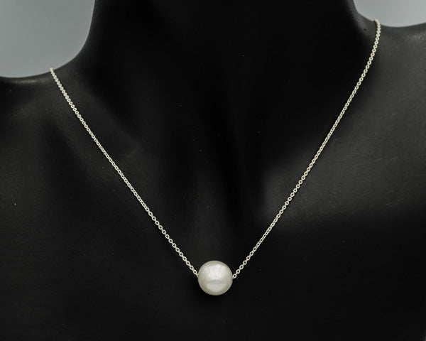 Sterling silver floating pearl chain