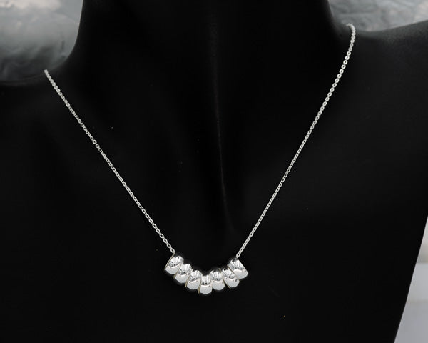 Sterling silver chain with 7 rings