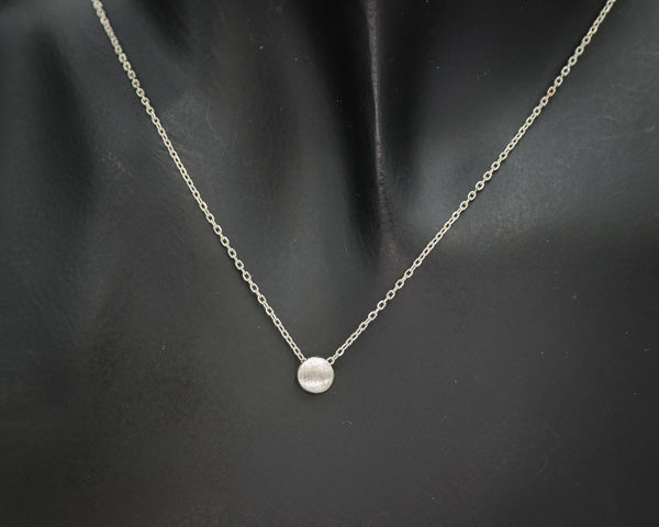 Sterling silver chain with a small brushed silver disc - Silvertree Jewelry #