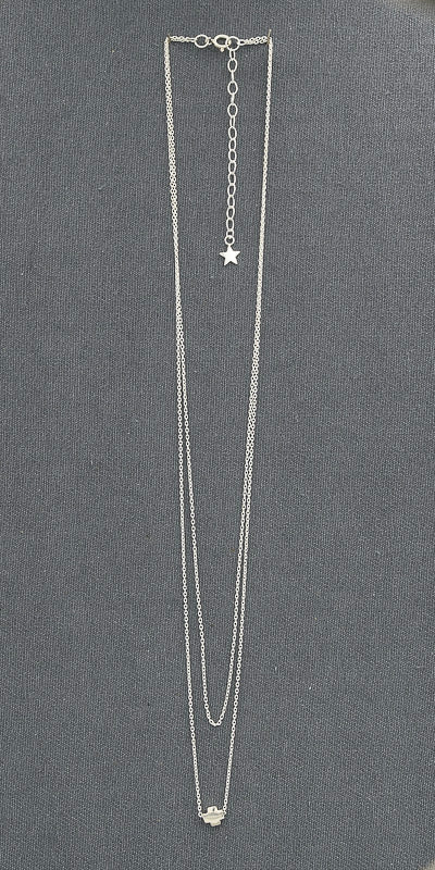 Sterling silver double chain with a cross