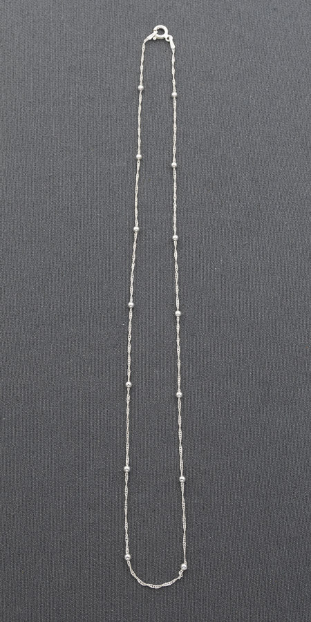 Sterling silver singapore chain with 2.5 mm silver balls.