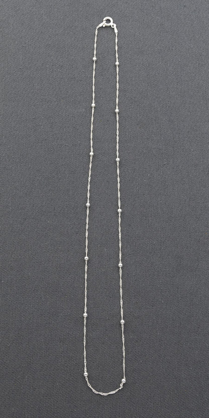 Sterling silver singapore chain with 2.5 mm silver balls.